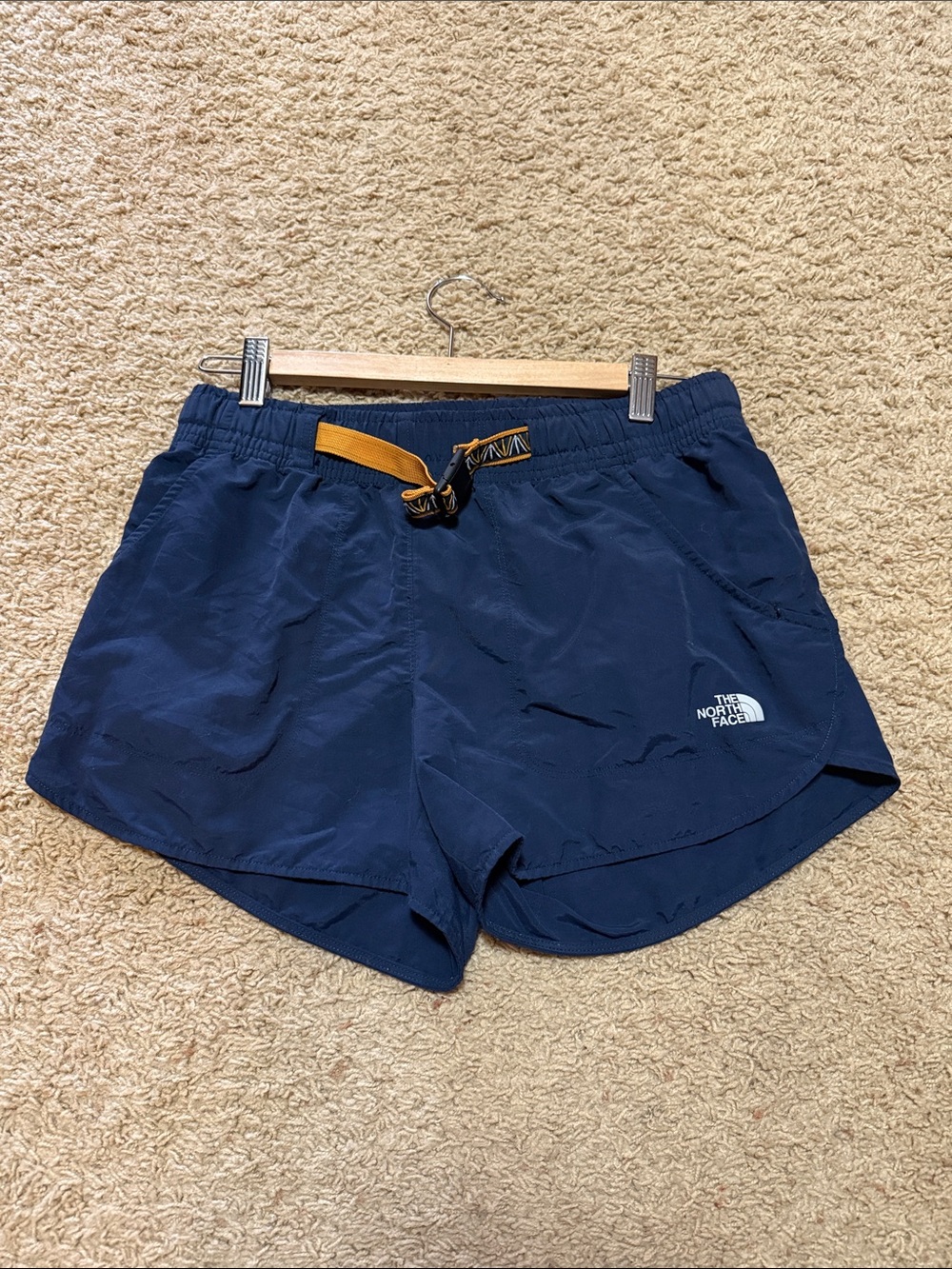 The North Face Women's Navy Blue Athletic Shorts with Yellow Drawcord